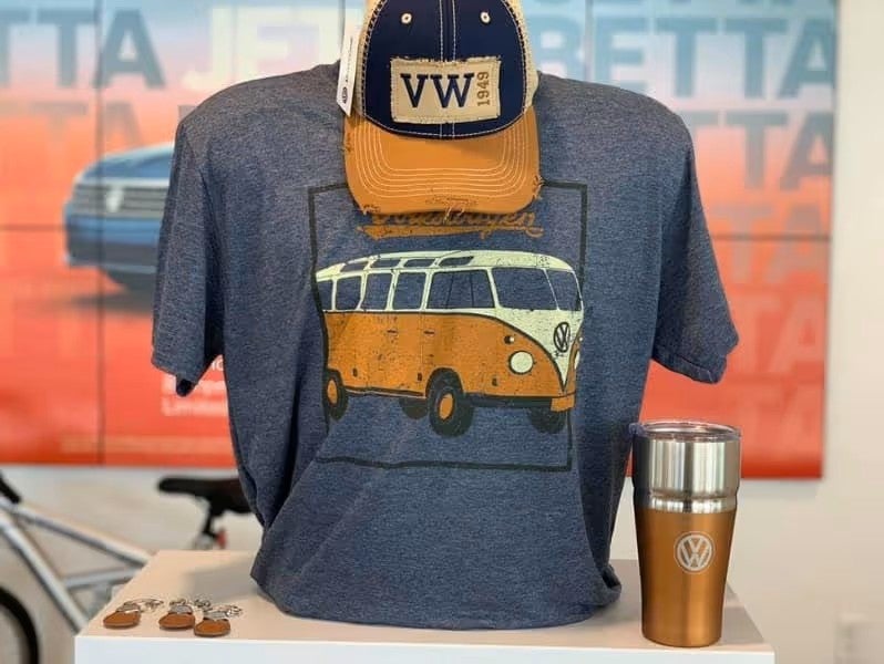 A display of Volkswagen merchandise including a shirt