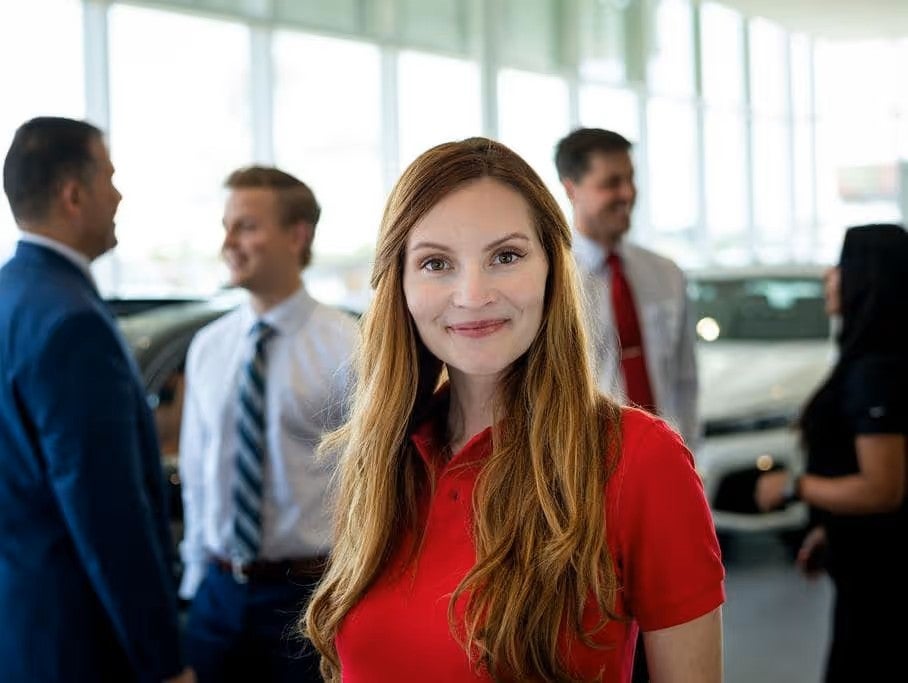 A person standing inside the BMW showroom